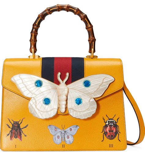 gucci yellow bag with moth|Gucci handbags.